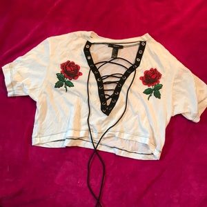crop top with rose and lace up detail